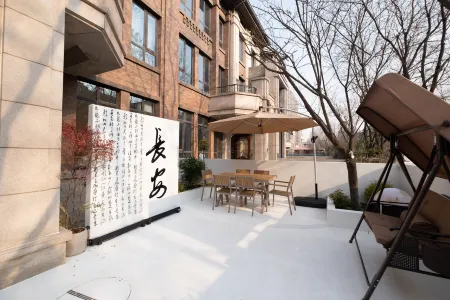 Yimu Yishu Garden Homestay (Xi'an Big Wild Goose Pagoda Datang Everbright City Branch) Отели рядом с достопримечательностью «Jingyugou Scenic Resort, Xi'an»