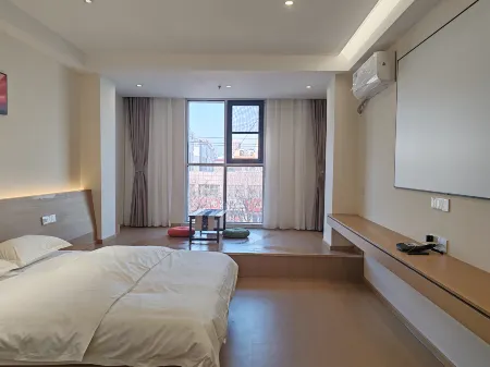 Qiancheng Hotel (Defu Jian Cai Cheng) Отели рядом с достопримечательностью «Prague Herb Garden»