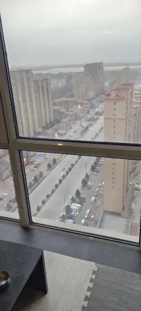 Yuwan B&B (Daqing Wanda Plaza) Отели рядом с достопримечательностью «Daqing Normal University»