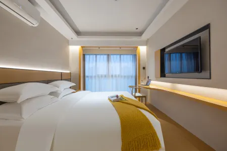 Junlan Li Feng light luxury hotel（Cixi Hangzhou Bay Century City store） Отели рядом с достопримечательностью «Ningbo Engineering College»