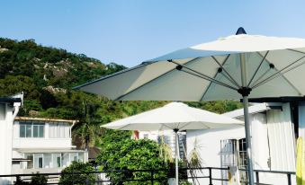 Xiamen Banxia Time Homestay (Zengcuo'an Huandao Beach Bathhouse Store)