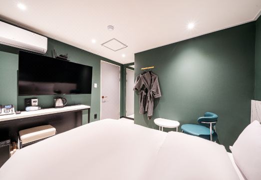 용산 메이 호텔의 깔끔한 객실 이미지