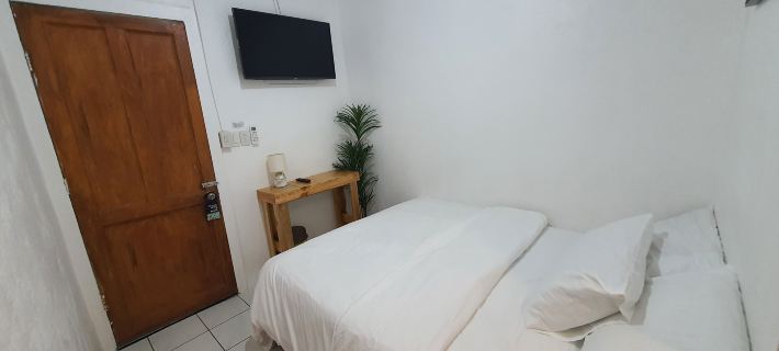 West Coast Beach House Hoteles en Moalboal