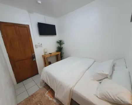 West Coast Beach House Hoteles en Moalboal