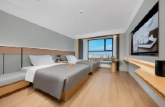QIANNA HOTEL GLORIOUS (Zhoukou Chuanhui District High-speed Railway East Station Branch)