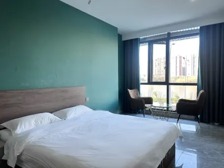 Shierzeshengxiao Hotel Отели в г. Гуаншань