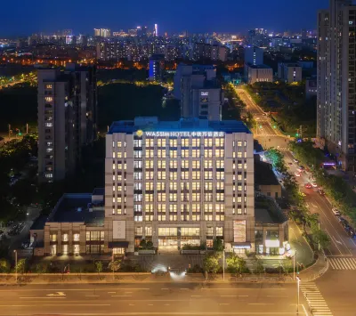 Wassim Hotel Hotels near Campus of Jinjiang College of Adult Education College of Lixin University of Commerce