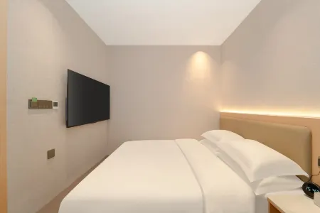 Weiji Hotel (Shanghai Hongqiao Airport National Convention and Exhibition Center Branch) Отели рядом с достопримечательностью «Xinjing Park»