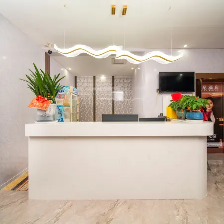 Weini Hotel (Yiyang Railway Station Olympic Park)