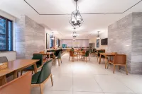 โรงแรมซิตี้ คอมฟอร์ต อินน์ (เฮอฝูตงเฉิง ใจกลางเมืองชิงหยวน) - พร้อมWifi
