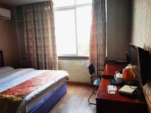 Xinyi Business Hotel - Inns
