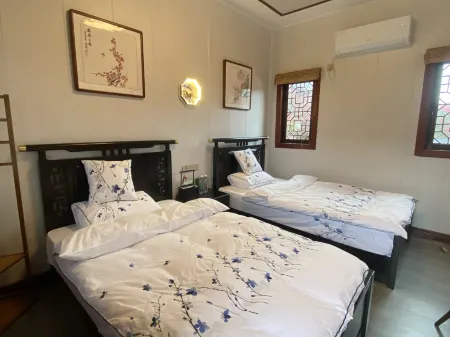 Baizhen Hostel Отели рядом с достопримечательностью «Golden Rooster Ridge»