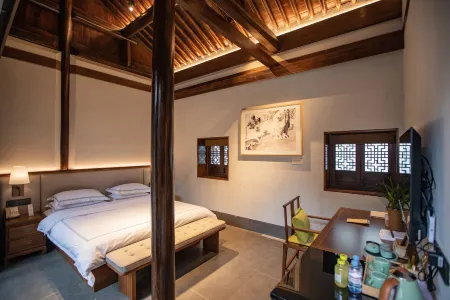 Qing Teng Bie Yuan Отели рядом с достопримечательностью «Datong School»