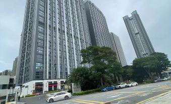 Youyu Hotel Apartment (Overseas Chinese City Happy Coast Branch)