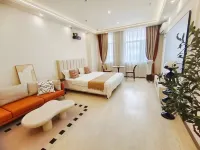 芒果自助公寓（中醫葯大學凱旋廣場店）