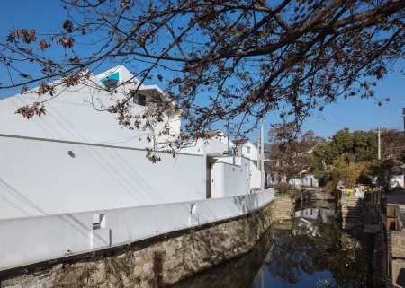 Miss Gu's Boutique Homestay Отели рядом с достопримечательностью «Shanghai Customs College Suzhou Branch»