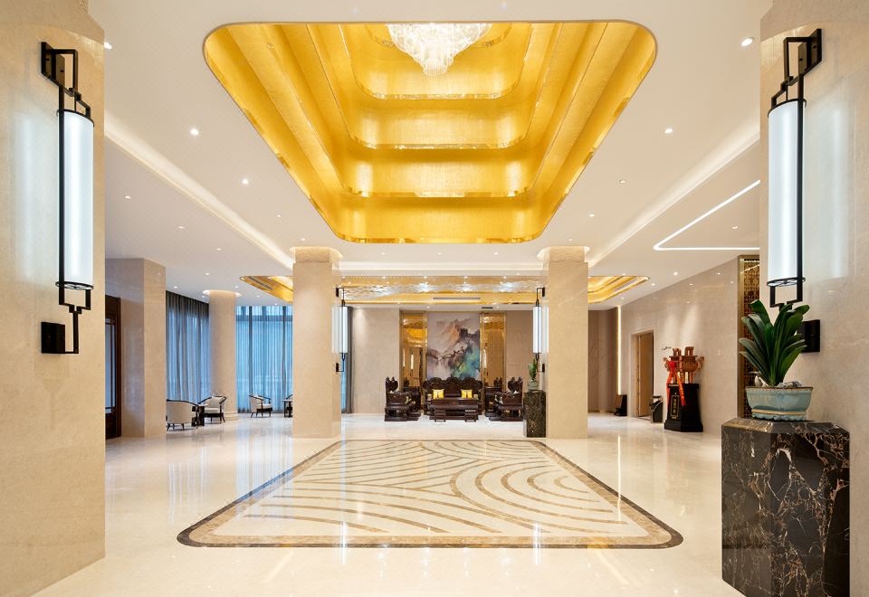 사처 징안로 렌조이 호텔의 넓고 깨끗한 객실 모습