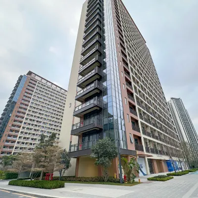 逸趣國際影視公寓（中山萬科深業灣中新城店） 鄰近灣中上城的酒店
