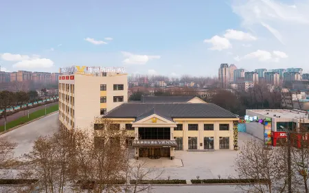 Vienna International Hotel Zhoukou Taikang Stadium County government branch Отели в г. Тайкан