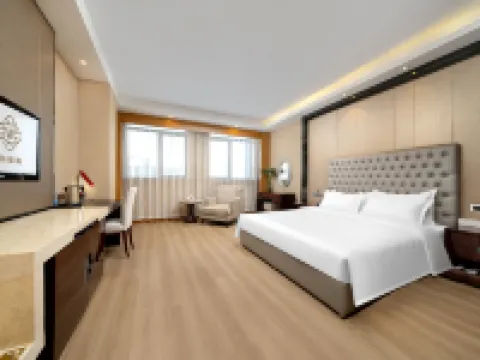Wanda Spring Business Hotel (Daqing Sa'ertu Wanda Plaza) Hoteles en Daqing