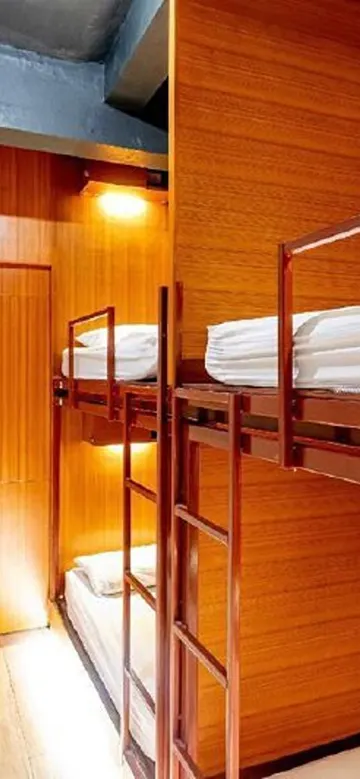 ห้องเตียงแฝดราคาประหยัดและมีบริการห้องน้ำที่ใช้ร่วมกัน