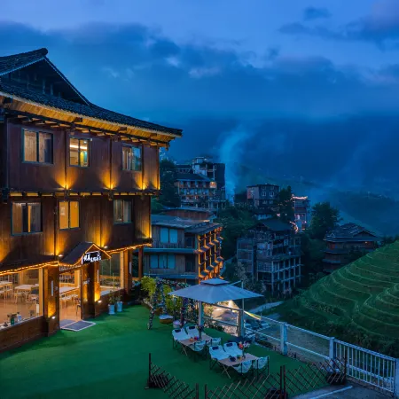 Yuelai Courtyard Hotel (Longsheng Longji Terrace Observation Deck) Отели в г. Луншэн