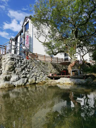 Moyunge Homestay (Sanqingshan Gangshou Cableway) Отели в г. Десин