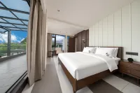 Muyang Qichi Lakeside Vacation Apartment - parking