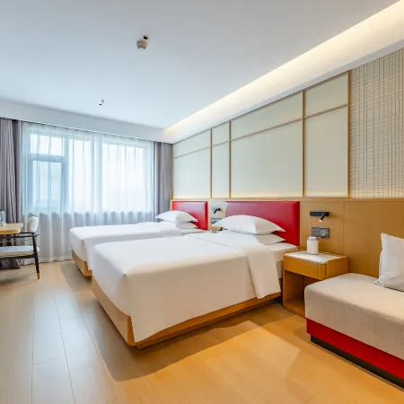Rezen Huasheng Hotel (Daqing East Station) Hotéis em Daqing