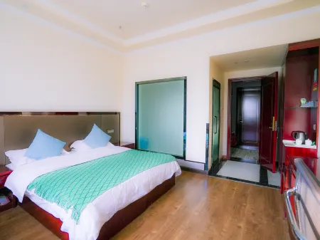 Baiwanjia Business Hotel Отели в г. Куча