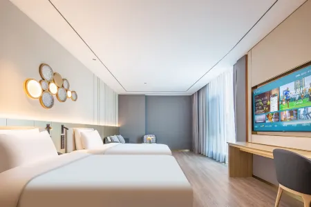 Orange Hotel Отели в г. Сяи