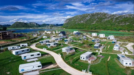 Puzhe Heiwei Guangxing River. Camp between Clouds and Water Отели рядом с достопримечательностью «Qiubei Puzhehei Wetland Park»