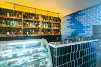 Buerjin Grand Xinjiang Hotel - bar
