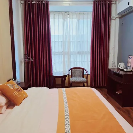 Longhui Hejia Hotel (East Bus Station)