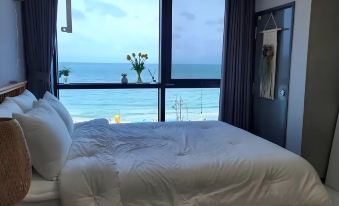 Easley Hotel Apartments(Wuchuan Dinglong Bay store)