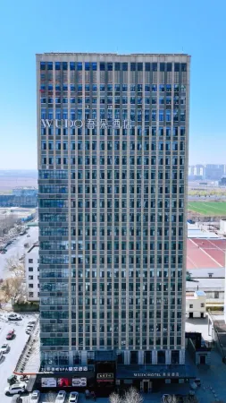 Wuduo Hotel (Baoding High speed Railway East Station Heda New District Branch) Отели рядом с достопримечательностью «Baoding University»