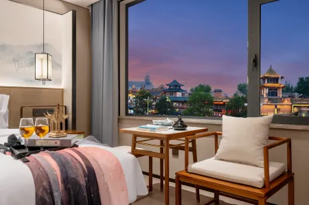 Moshang Qingju Hotel (Qufu Sankong Scenic Area) Отели рядом с достопримечательностью «Confucius Former Residence Garden»