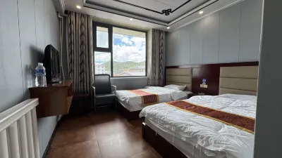 Luqulangmusi Quanxi Hotel Отели рядом с достопримечательностью «Храм Гельди»