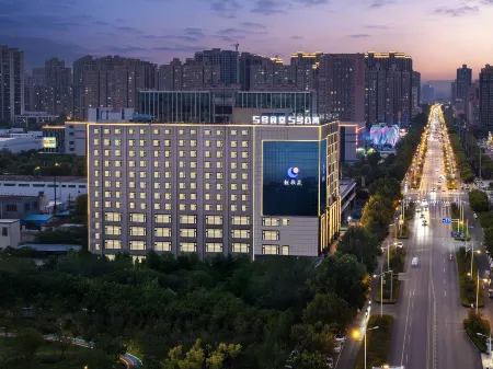 Wuhao Jingpin Hotel Отели рядом с достопримечательностью «Xinxiang University»