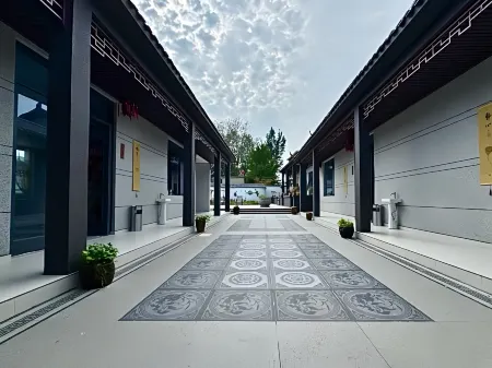 Weishan Xinyi Homestay Отели в г. Вейшань