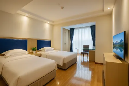 Xinzun Hotel (Leshan Station Jiaxing Road Food Street Store)