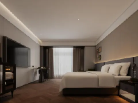 Xing Baisheng Hotel (Guanlan International) Hotele w: Powiat Xing