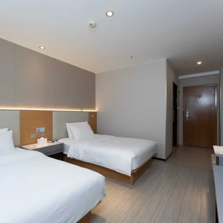 Check in at Pai Hotel (Yining Kazanqi Happy Carnival Smart Cultural Tourism Branch)