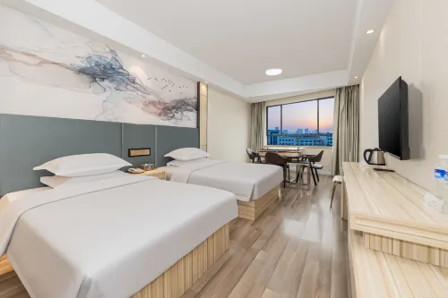 Xinjieyun Rongfeng Hotel ( Xiangyang Wanda Plaza Branch) - مطابخ