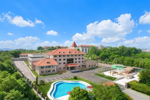 Qingdao Xinshatan Coast Holiday Hotel - 비치