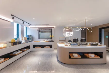 Ni Hao Hotel (Yizheng Zhenzhou Xi Road) Отели рядом с достопримечательностью «Yangzhou Expo Park»