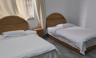 Longsheng Xinji Hotel - Housity