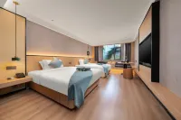 Mengjing Shangpin Hotel (Xishuangbanna Jinghong Poshuiguangchang Square)