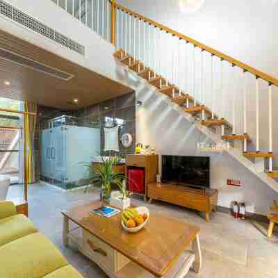 潿洲島芙羅拉私家花園度假民宿（貝殼沙灘店） Rooms