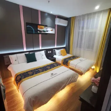 Qitaihe Jinwowo Fashion Hotel